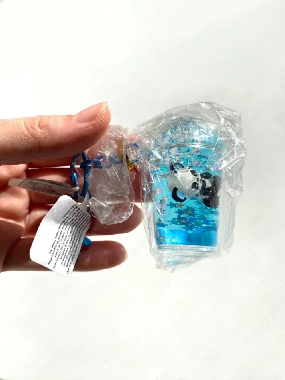 Claire's Gift Panda Tea Water Filled Glitter Keychain Scrunchie Hair Tie